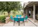 Inviting backyard patio area with outdoor seating and lush greenery at 47 Torrey Pine Dr, Brownsburg, IN 46112
