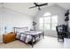 Nicely decorated bedroom with ceiling fan, desk, bed and windows at 47 Torrey Pine Dr, Brownsburg, IN 46112
