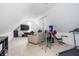 Finished attic bonus room with workout equipment, TV and lots of space at 47 Torrey Pine Dr, Brownsburg, IN 46112