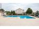Community pool featuring ample seating and a well-maintained pool area for residents to enjoy at 47 Torrey Pine Dr, Brownsburg, IN 46112