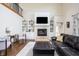 Comfortable living room with soaring ceilings and abundant natural light creates a welcoming atmosphere at 47 Torrey Pine Dr, Brownsburg, IN 46112