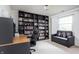 Office space with desk, chair, sofa and large bookcase at 47 Torrey Pine Dr, Brownsburg, IN 46112