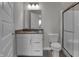 Bathroom features a modern vanity with solid surface countertop and a glass door shower at 5076 Foxley Park Ln, Avon, IN 46123