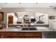 Kitchen featuring granite countertops, stainless steel appliances, and an open view of the living room at 5194 Orahood Ct, Plainfield, IN 46168