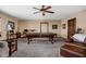 Spacious recreation room features a billiard table, chairs, and lots of natural light at 5194 Orahood Ct, Plainfield, IN 46168