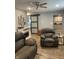 Inviting living room featuring comfortable seating and a decorative fireplace for a cozy atmosphere at 52 S 16Th Ave, Beech Grove, IN 46107