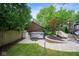 Relaxing backyard oasis featuring a hot tub and outdoor seating with a beautiful stone patio at 5425 N Delaware St, Indianapolis, IN 46220