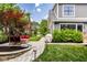 Inviting backyard featuring a paved patio area, lush landscaping, and a built-in barbeque at 5425 N Delaware St, Indianapolis, IN 46220
