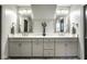 Double vanity bathroom with ample lighting and modern fixtures at 5425 N Delaware St, Indianapolis, IN 46220