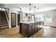 A spacious kitchen island features a sink and lots of storage at 5425 N Delaware St, Indianapolis, IN 46220