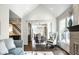 Comfortable living room featuring an open floor plan and seamless access to the dining area at 5425 N Delaware St, Indianapolis, IN 46220