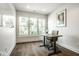 Bright home office with hardwood floors and large windows at 5425 N Delaware St, Indianapolis, IN 46220