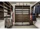 Custom walk-in closet with drawers, shelving and wire baskets at 5425 N Delaware St, Indianapolis, IN 46220
