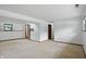 Large living room with neutral carpet, perfect for entertaining or Gathering gatherings at 5847 Democracy Dr, Indianapolis, IN 46254