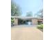Attached two-car garage providing ample parking and storage at 623 Chariot Ln, Indianapolis, IN 46227