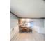 Spacious kitchen with breakfast bar and stools, hardwood floors, and modern appliances at 623 Chariot Ln, Indianapolis, IN 46227