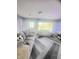 Comfortable living room with large windows and neutral decor at 623 Chariot Ln, Indianapolis, IN 46227
