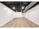 Spacious unfinished basement with modern flooring and painted ceiling for an industrial aesthetic at 6337 Cardinal Ln, Indianapolis, IN 46220