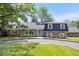 Classic home showcasing a well-manicured lawn and traditional architectural design at 6337 Cardinal Ln, Indianapolis, IN 46220