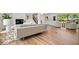 Bright living room featuring hardwood floors, fireplace, and modern decor at 6337 Cardinal Ln, Indianapolis, IN 46220