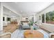 Open-concept living room features natural light and flows into the kitchen and dining areas at 6337 Cardinal Ln, Indianapolis, IN 46220