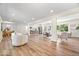 Open floor plan integrating living, dining, and kitchen areas with modern finishes at 6337 Cardinal Ln, Indianapolis, IN 46220