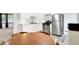 Well-lit kitchen features modern stainless appliances, light countertops, and durable flooring at 6616 S Cross St, Pendleton, IN 46064