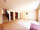 Open floor plan in living room with access to second floor at 7038 E 65Th St, Indianapolis, IN 46256