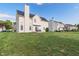 Spacious backyard with well-kept grass, perfect for Gathering gatherings and outdoor fun; includes a cozy patio area at 7356 Woodington Pl, Indianapolis, IN 46259