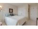 Bright bedroom featuring a large window and mirror at 7356 Woodington Pl, Indianapolis, IN 46259