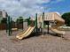 A playground featuring slides and other structures, set in a safe and fun environment at 7356 Woodington Pl, Indianapolis, IN 46259