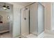 Walk-in shower with glass door at 7356 Woodington Pl, Indianapolis, IN 46259