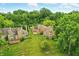 Aerial view of the property showcases the lake community at 7414 Harbour, Indianapolis, IN 46240
