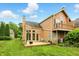 Charming home with a wooden deck and a well-maintained backyard at 7414 Harbour, Indianapolis, IN 46240
