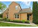 Inviting two-story home featuring cedar shake siding, well-maintained landscaping, and a charming entrance at 7414 Harbour, Indianapolis, IN 46240