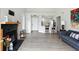 Open floor plan featuring a brick fireplace, vaulted ceilings and easy access to the kitchen at 7414 Harbour, Indianapolis, IN 46240