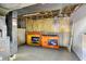 Unfinished basement with exposed insulation, and boxes in the room at 7720 Langwood Dr, Indianapolis, IN 46268