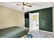 Cozy bedroom featuring natural light and carpet flooring at 7720 Langwood Dr, Indianapolis, IN 46268