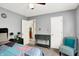 Comfortable bedroom with an ensuite bathroom and ample sunlight at 7720 Langwood Dr, Indianapolis, IN 46268