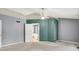 Spacious bedroom featuring a ceiling fan, and entry to the en suite bathroom at 7720 Langwood Dr, Indianapolis, IN 46268