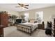 The spacious bedroom features plush carpeting, ample natural light, and a comfortable, inviting atmosphere at 7906 States Bend Ln, Indianapolis, IN 46239
