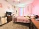 Pink themed bedroom featuring carpet flooring, vanity, and dresser at 7906 States Bend Ln, Indianapolis, IN 46239