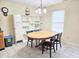 Bright dining room with natural light and a large dining table at 7906 States Bend Ln, Indianapolis, IN 46239