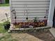 Vibrant garden with colorful flowers and decorative accents, adding charm to the exterior landscape at 7906 States Bend Ln, Indianapolis, IN 46239