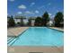 Inviting community pool area with clear blue water and plenty of space for relaxation and recreation at 7906 States Bend Ln, Indianapolis, IN 46239