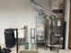 Basement featuring a utility sink, water heater, and furnace at 806 S Jefferson St, Brownsburg, IN 46112