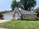 Charming brick single Gathering home featuring a well manicured lawn and attached garage at 806 S Jefferson St, Brownsburg, IN 46112