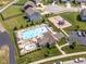 Aerial view of community pool, clubhouse, playground, and parking area at 8842 Twain Ln, Indianapolis, IN 46239