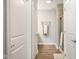 Bathroom hallway featuring a doorway to the shower, and towels at 8842 Twain Ln, Indianapolis, IN 46239