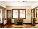 Well-lit home office with hardwood floors and stylish decorative details at 972 N Audubon Rd, Indianapolis, IN 46219